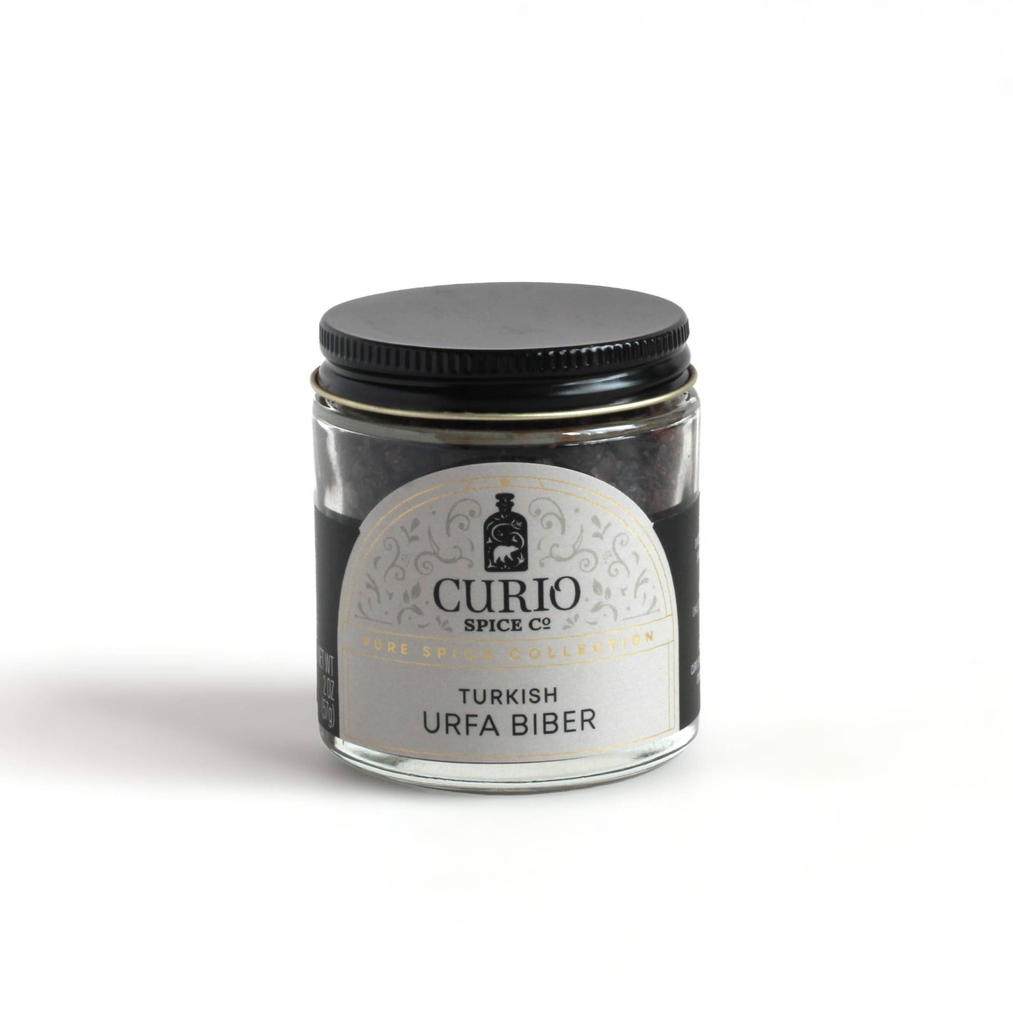Turkis Urfa Biber by Curio Spice Co in a glass jar. Urfa Chilli Flakes