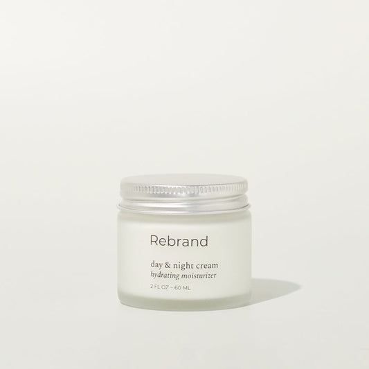 Day & Night Cream Hydrating Moisturizer in a glass jar and metal lid. 2 fl oz. earth friendly zero waste refillable eco conscious skincare