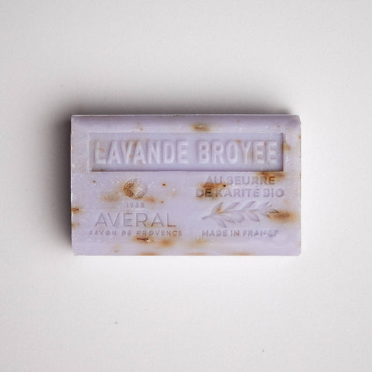 Lavender purple bar of soap with exfoliating texture. Stamped with Lavende Broyee, au beurre de karite bio, made in france, averal savon de provence on the front. Gentle lavender french bar of soap. 