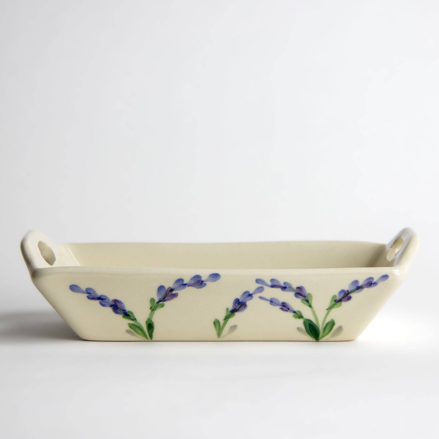 Stoneware Ceramic cracker serving basket. Hand painted lavender flowers on the side. Creamy white color. 