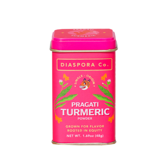 Pragati turmeric powder inside a pink metal tin spice container. Illustration of turmeric plant with flower and root. Single origin spices. Grown for flavor rooted in equity