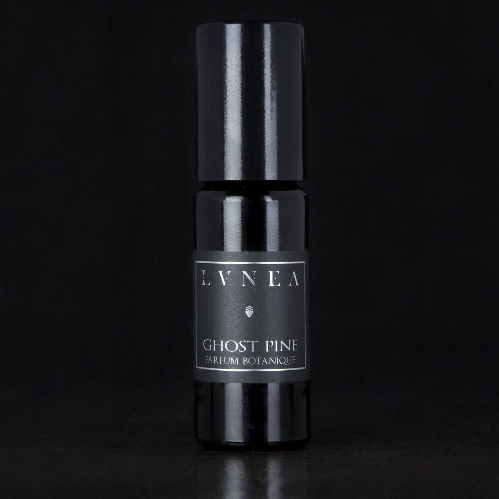 Ghost Pine perfume by Lvnea. Black glass rollerball bottle. Parfum botanique. 